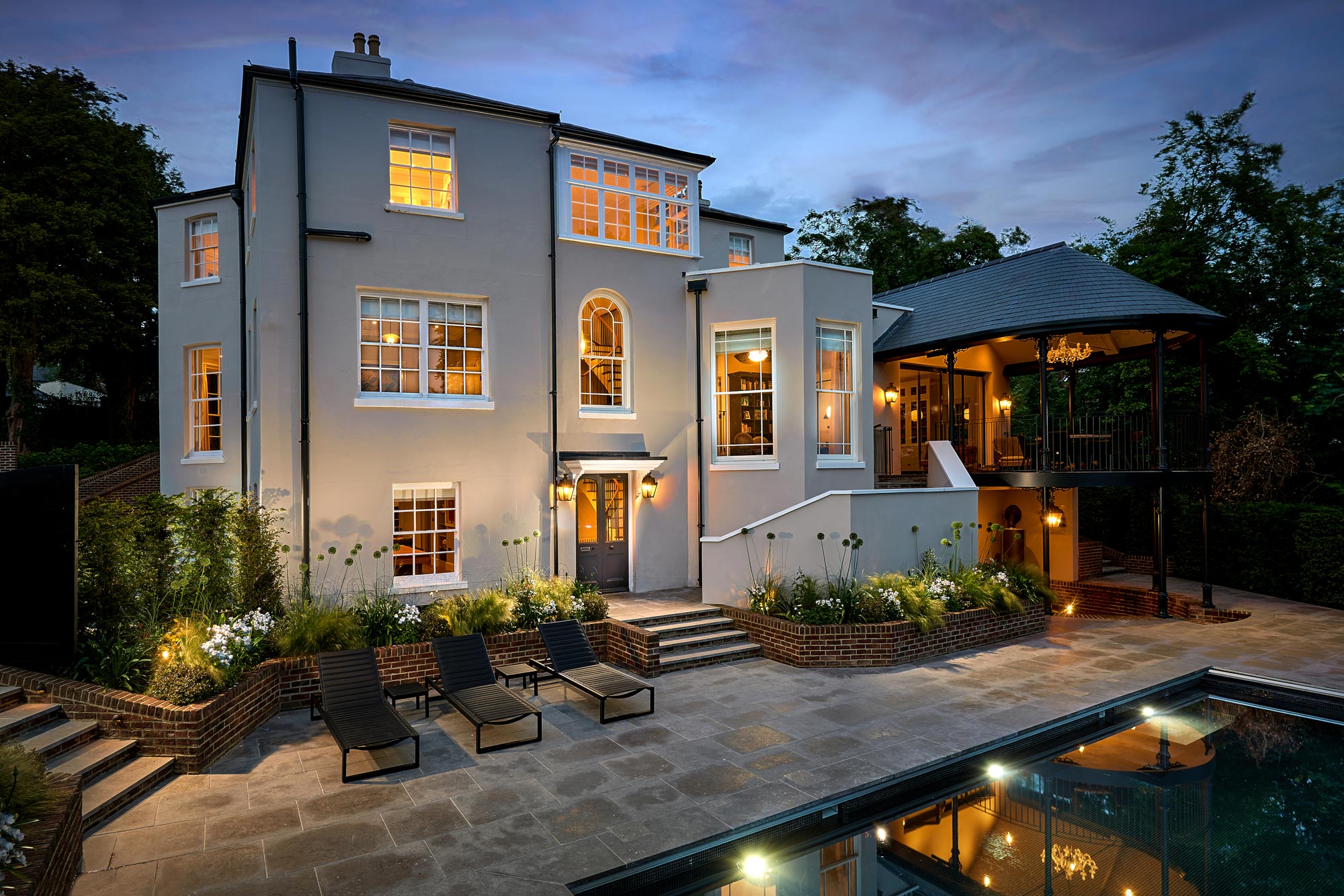 Exterior evening light - Georgian renovation and extension by KM Grant Guildford, Surrey